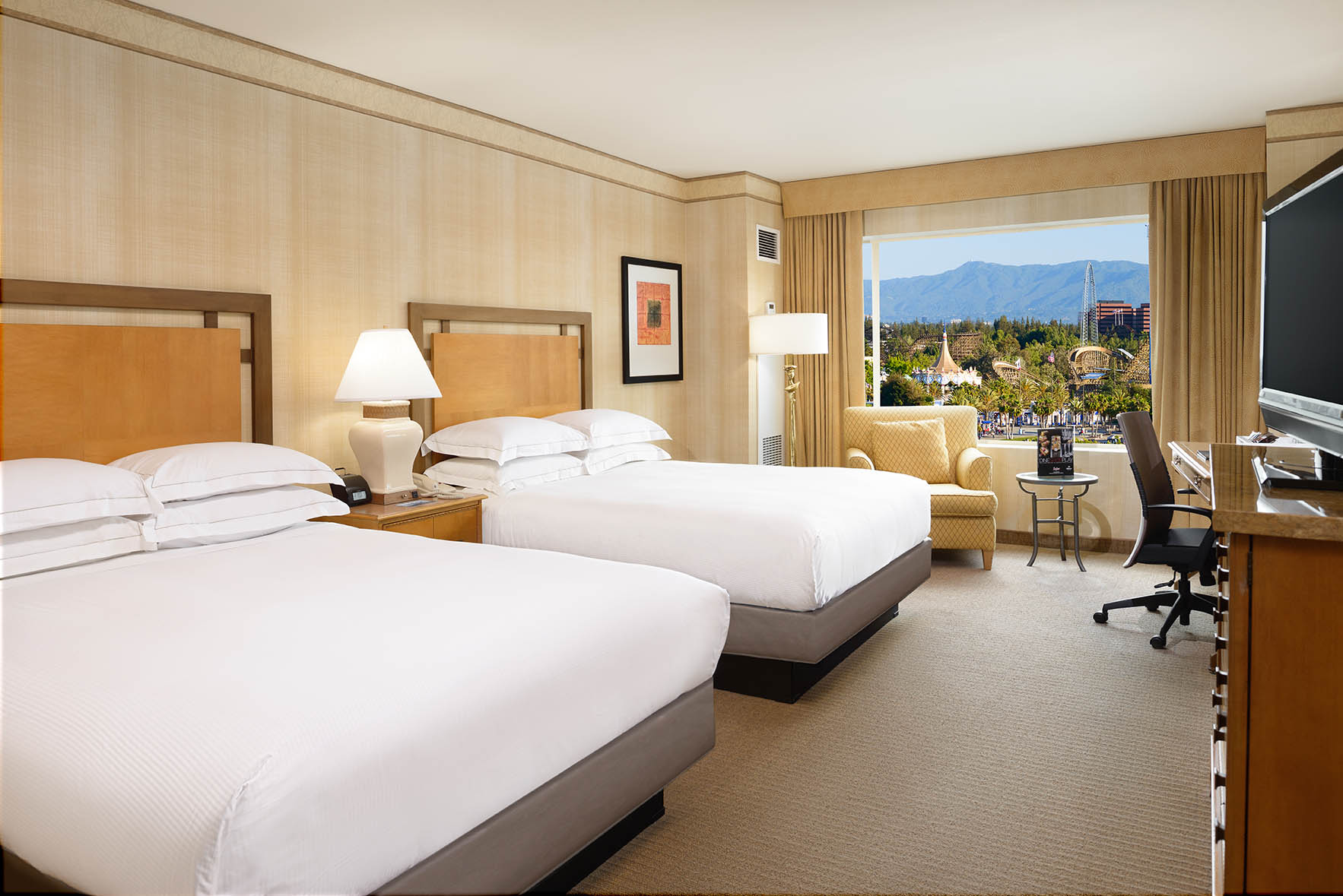 Double queen guest room at Hilton Santa Clara with stadium view – Santa Clara hotel rooms for business or family stays